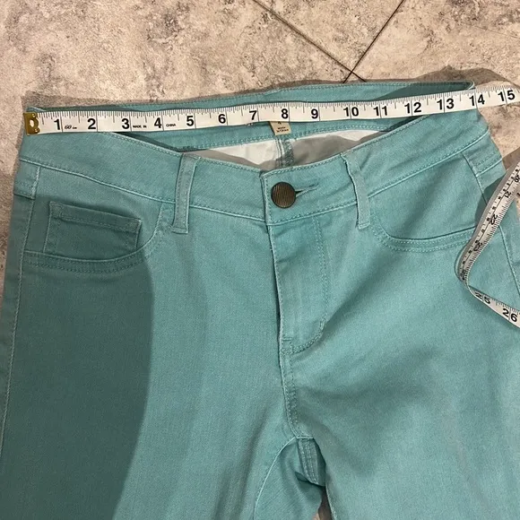 Cabi outfit striped cardigan and seafoam green skinny jegging jeans