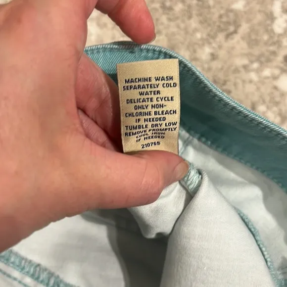 Cabi outfit striped cardigan and seafoam green skinny jegging jeans