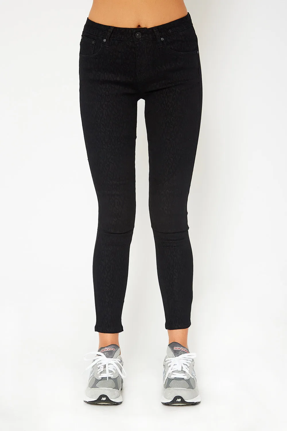Mid-rise black  leopard print skinny pants
