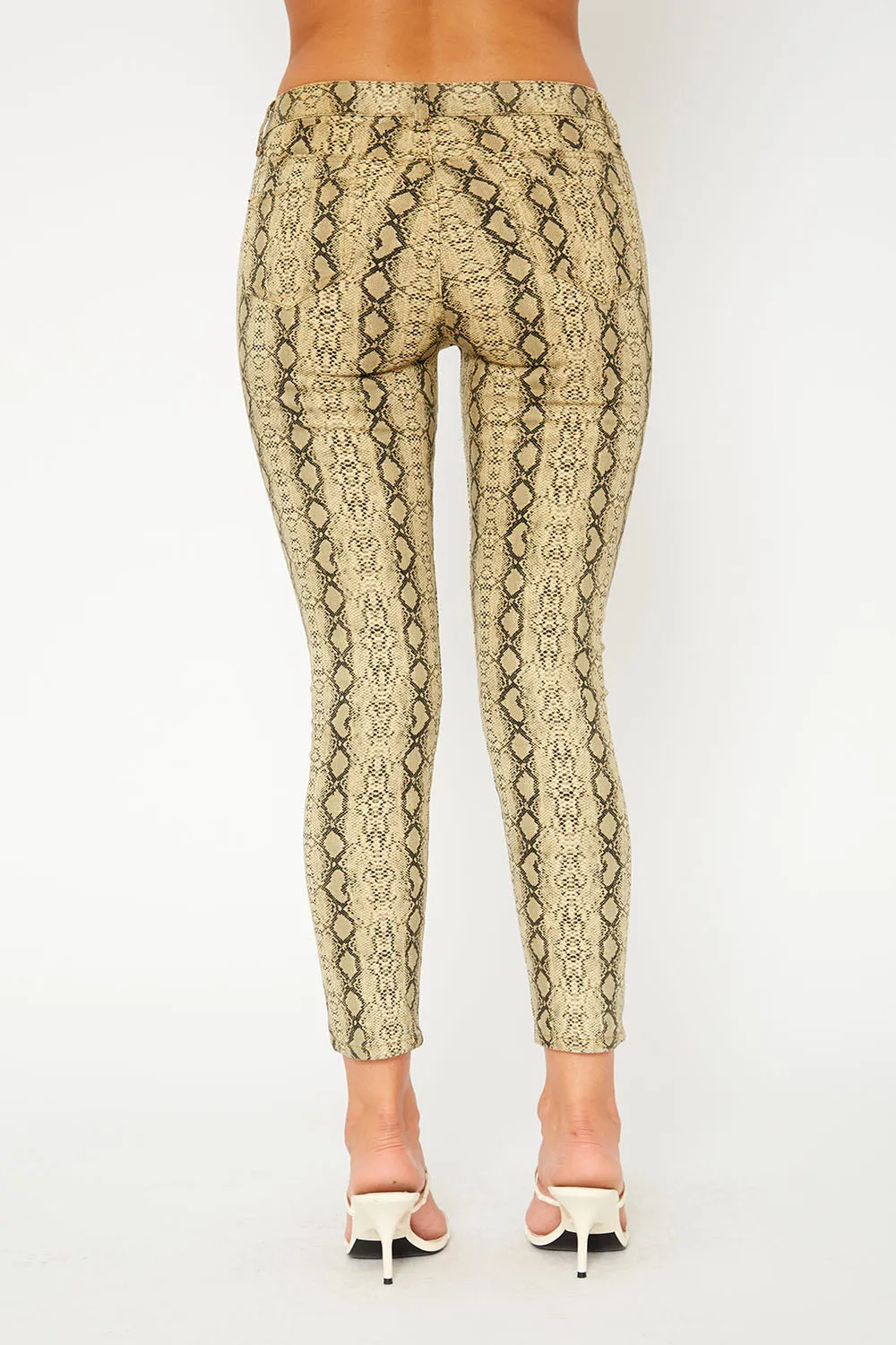 Mid-rise yellow snake print super skinny pants