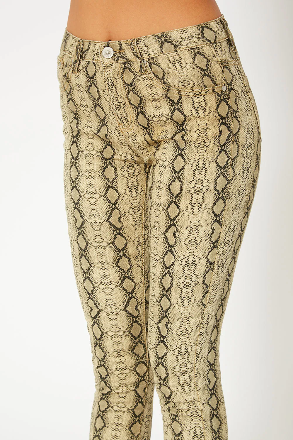 Mid-rise yellow snake print super skinny pants