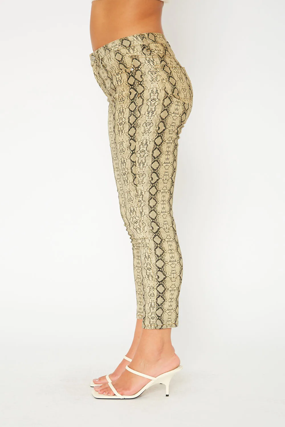 Mid-rise yellow snake print super skinny pants