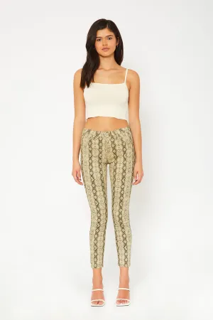 Mid-rise yellow snake print super skinny pants