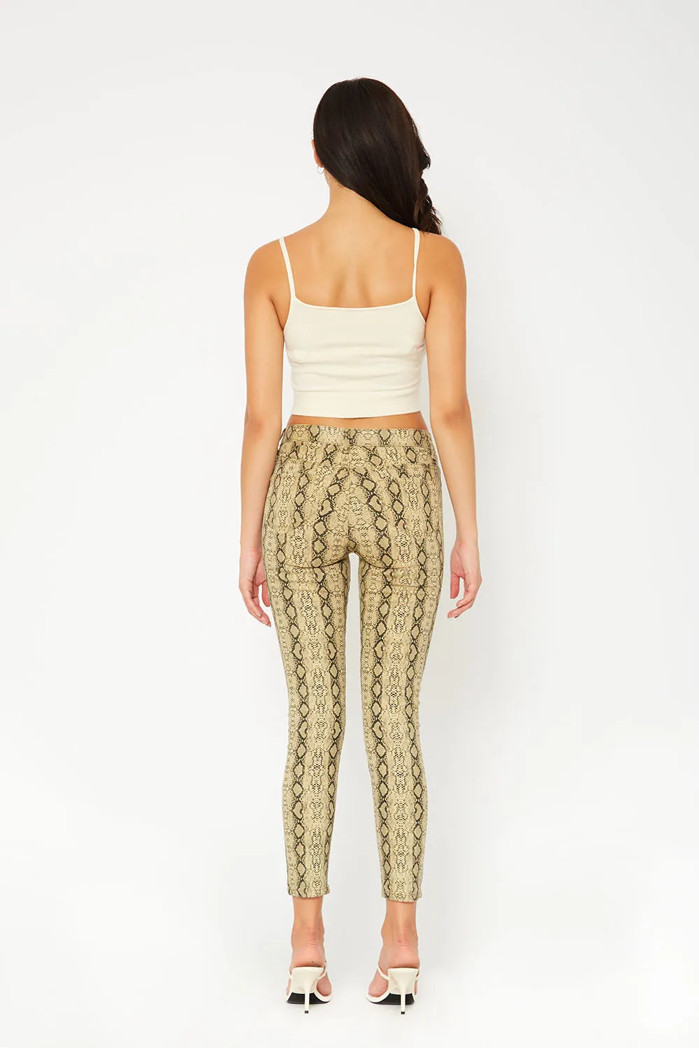 Mid-rise yellow snake print super skinny pants