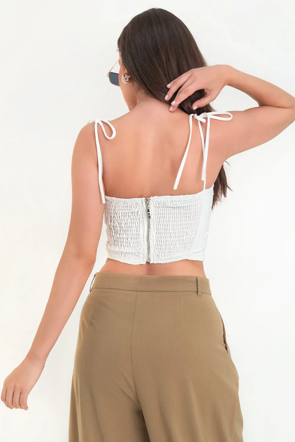 Top corset escote con plisados tirantes nudo